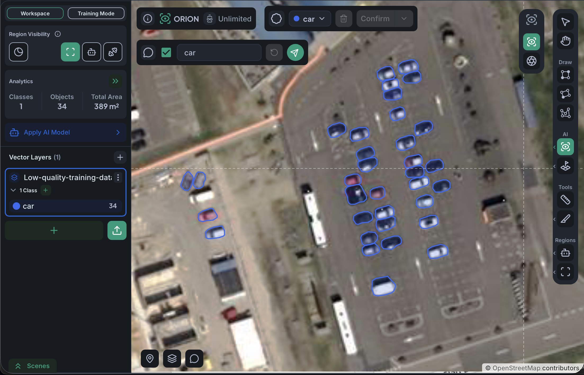 Cars detected in a parking lot at a resolution where the broad class is identifiable but finer distinctions like cars vs vans would not be reliable